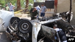 A handout picture provided by Syria's ministry of interior press office May 10, 2023, shows Syrian investigators checking the site of an explosion in Damascus' Barzeh neighborhood. (Syrian Ministry of Interior via AFP)