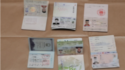 Seized passports (Public Affairs Department, Singapore Police Force)