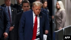 Former U.S. President Donald Trump leaves New York City's Manhattan Criminal Court in New York City after attending the day's proceedings at his trial for allegedly covering up hush money payments linked to reported extramarital affairs, April 23, 2024.