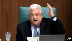 FILE - Presiden Palestina Mahmoud Abbas dalam konferensi pers di Kairo, Mesir, 12 Februari 2023. (AP/Amr Nabil)