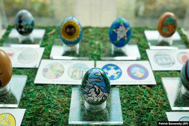 FILE - Decorative eggs designed by students from the United States' 56 states and territories are on display in the White House, April 6, 2023, in Washington. (AP Photo/Patrick Semansky)