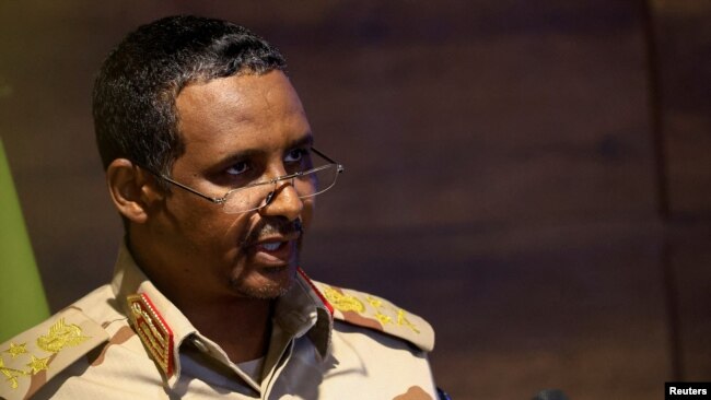 FILE - Deputy head of Sudan's sovereign council General Mohamed Hamdan Dagalo speaks during a press conference at Rapid Support Forces head quarter in Khartoum, Sudan, Feb. 19, 2023.