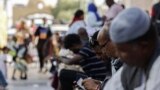 FILE: Passengers fleeing war-torn Sudan arrive at Qastal land port crossing between Egypt and Sudan on May 13, 2023. 