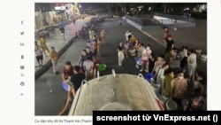 Cư dân lấy nước từ xe bồn. (Hình: Screenshot từ VnExpress.net)