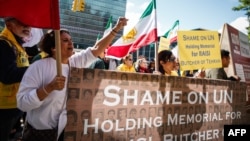 Demonstrators gather outside the United Nations headquarters to protest the U.N. General Assembly holding a tribute to the late Iranian President Ebrahim Raisi in New York City on May 30, 2024.