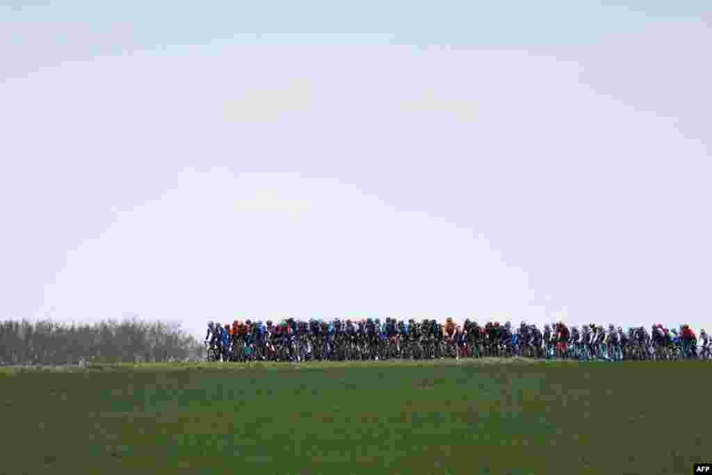 The pack rides during the 1st stage of the 81st Paris - Nice cycling race, 169,4 km between La Verriere and La Verriere, France.