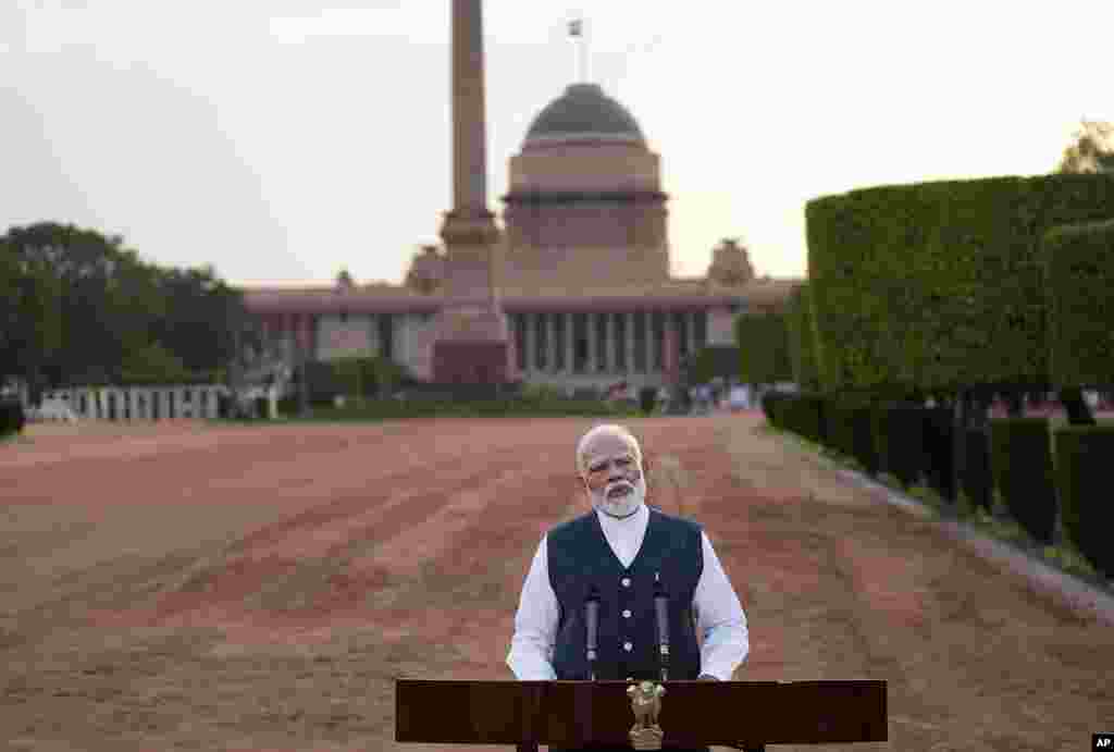 Indian Prime Minister Narendra Modi speaks to the media outside the Rashtrapati Bhavan after receiving a letter from the President of India, Draupadi Murmu, inviting him to form the next central government, in New Delhi, India.