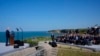 U.S. President Joe Biden speaks about bravery, democracy and D-Day as he stands next to the Pointe du Hoc monument in Normandy, France, June 7, 2024.