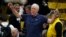 FILE - Television analyst Bill Walton stretches before the first half of an NCAA college basketball game between Oregon and Colorado, Jan. 2, 2020, in Boulder, Colorado. 