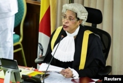 Uganda's Speaker Anita Among leads the session during the proposal of the anti-homosexuality bill in the Parliament in Kampala, Uganda, March 9, 2023.