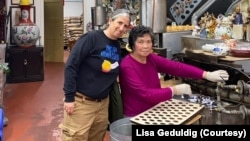 Kung Pao Kosher Comedy show founder and host Lisa Genduldig left, with Golden Gate Fortune Cookie Factory owner Nancy Tom. Each year, the comedy show features fortune cookies filled with Yiddish proverbs from the fortune cookie factory.