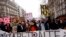 FILE: Protesters march during a demonstration in Paris, France, Wednesday, March 15, 2023. Opponents of French President Emmanuel Macron's pension plan are staging a new round of strikes and protests