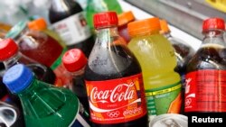 FILE -- A Coca-Cola bottle is seen with other beverages in New York.