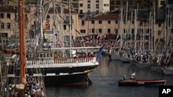 The Belem, the three-masted sailing ship which is carrying the Olympic flame, enters the Old Port in Marseille, southern France, May 8, 2024. 