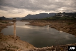 FILE - The Zahara-El Gastor reservoir is seen during a drought episode, in Zahara de la Sierra in the southern province of Cadiz, Spain.