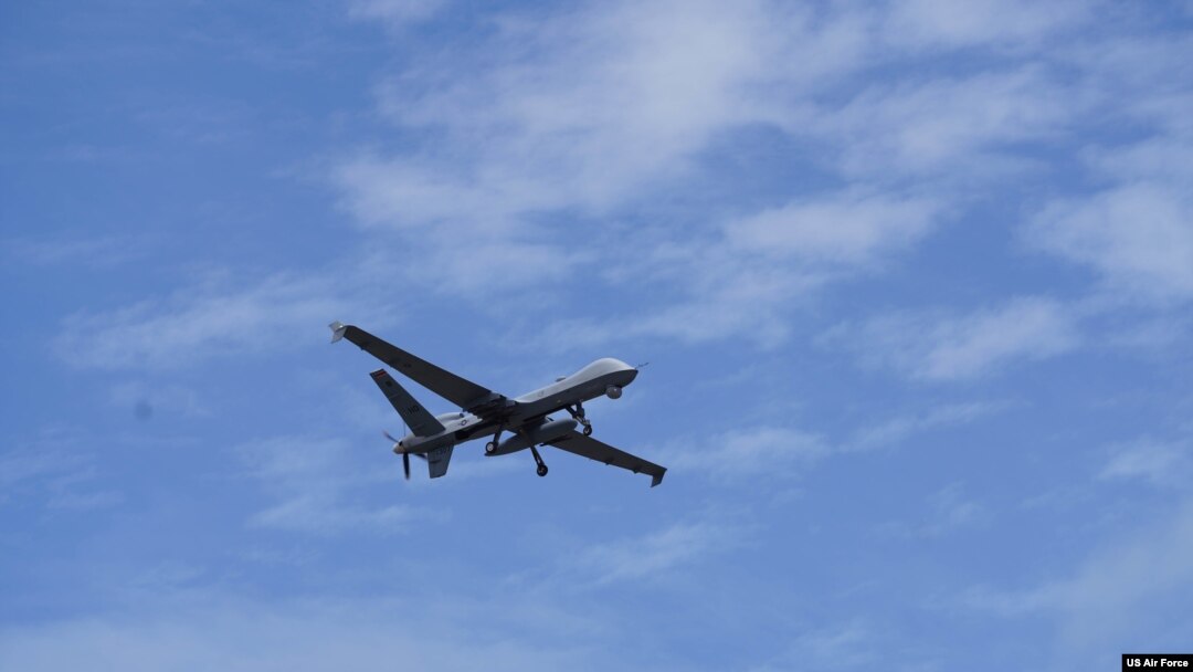 FILE - A US Air Force MQ-9 Reaper assigned to the 49th Wing flies over Marine Corps Air Station Kaneohe Bay, Hawaii, during Rim of the Pacific (RIMPAC) 2022.