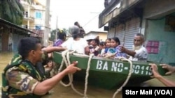 Troops help evacuate people in Feni, eastern district of Bangladesh. 