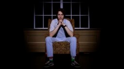 Grayson Hart sits for a portrait at the Ned R. McWherter West Tennessee Cultural Arts Center in Jackson, Tennessee, on Saturday, March 4, 2023. Hart was accepted into every college he applied to, but turned them down. He now directs a youth theater program.