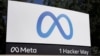 FILE - Facebook's Meta logo sign is seen at the company headquarters in Menlo Park, Calif., Oct. 28, 2021.
