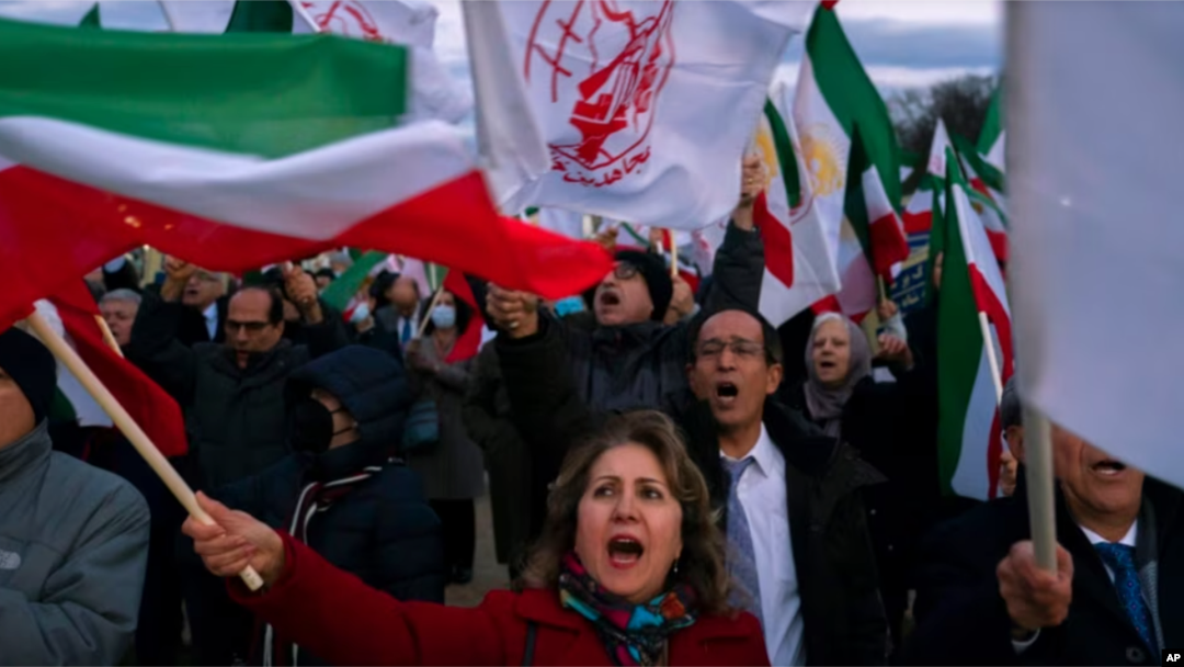 Demonstrators march past the U.S. Capitol in Washington during a Dec. 17, 2022, rally and vigil in solidarity with rallies in Iran 