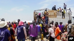 People who crossed from Sudan are seen at a refugee camp in Renk County, South Sudan, Wednesday, May 3, 2023.