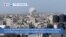 VOA60 World- Smoke fills the Gaza City skyline after another day of Israeli bombardment