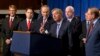 FILE - Sen. Lindsey Graham, center, speaks of immigration reform legislation outlined by the Senate's "Gang of Eight" that would create a path for unauthorized immigrants to apply for U.S. citizenship, April 18, 2013, in Washington.