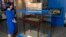 FILE - In this May 2023 photo, Luci Baines Johnson looks at the desk that her father, President Lyndon B. Johnson, sat at to sign the Voting Rights Act of 1965. The desk is on display at the LBJ Presidential Library in Austin, Texas.