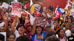 Supporters of Venezuelan President Nicolas Maduro attend at a campaign rally in the Catia neighborhood of Caracas, Venezuela, July 18, 2024. 