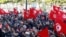 Supporters of Tunisia's Salvation Front opposition wave flags during a protest over the arrest of some of its leaders and other prominent critics of the president, in Tunis, March 5, 2023. 