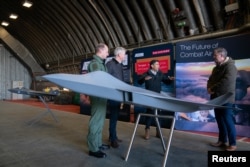 Prime Minister Rishi Sunak visits RAF Coningsby in Linconshire, Dec. 9, 2022, following the announcement that Britain will work to develop next-generation fighter jets with Italy and Japan. The jets, called Tempest in the UK, are to take to the skies by 2035 and serve as a successor to the RAF Typhoon.