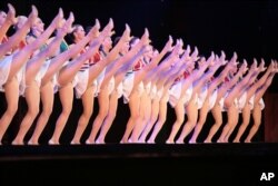 FILE - The Radio City Rockettes perform in the annual "Radio City Christmas Spectacular," marking its 75th year in New York City, Nov. 14, 2007. (AP Photo/Bebeto Matthews)