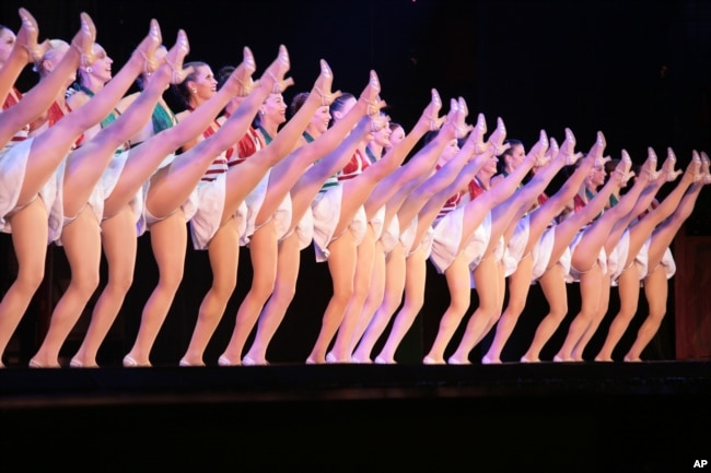 FILE - The Radio City Rockettes perform in the annual "Radio City Christmas Spectacular," marking its 75th year in New York City, Nov. 14, 2007. (AP Photo/Bebeto Matthews)