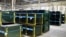Stacks of panes are shown during a tour of the Fuyao Glass America plant, Oct. 7, 2016, in Moraine, Ohio. The Chinese automotive glass maker said it was not the target of a federal probe that last week temporarily halted production at its Ohio plant.