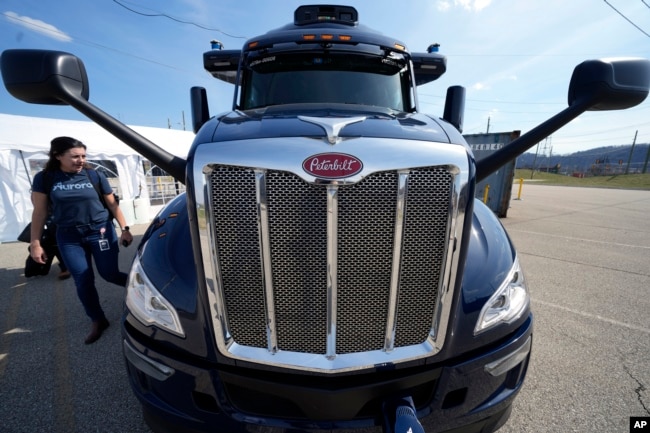 A self-driving tractor trailer is displayed at a test track in Pittsburgh, Thursday, March 14, 2024. (AP Photo/Gene J. Puskar)