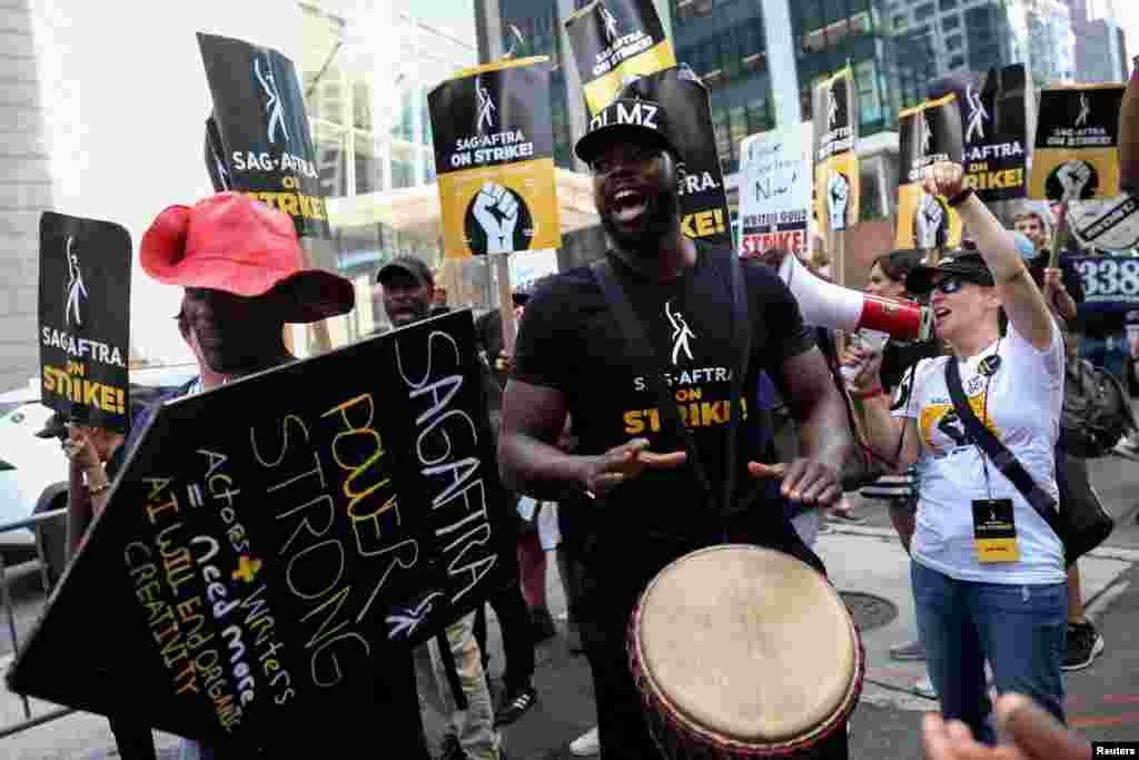 Actors, writers and other union members join SAG-AFTRA and WGA strikers in Manhattan in New York City.