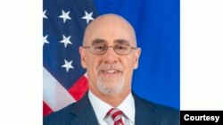 The United States of America (USA) Deputy Assistant Secretary in the Bureau of African Affairs, Ambassador Robert Scott