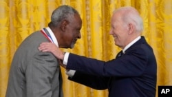 FILE - President Joe Biden awards the National Medal of Science to Gebisa Ejeta in the East Room of the White House, Tuesday, Oct. 24, 2023 in Washington.