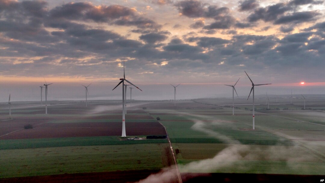 FILE - Wind turbines operate at an energy plant near Stetten, north of Kaiserslautern, Germany, as the sun rises March 19, 2024.
