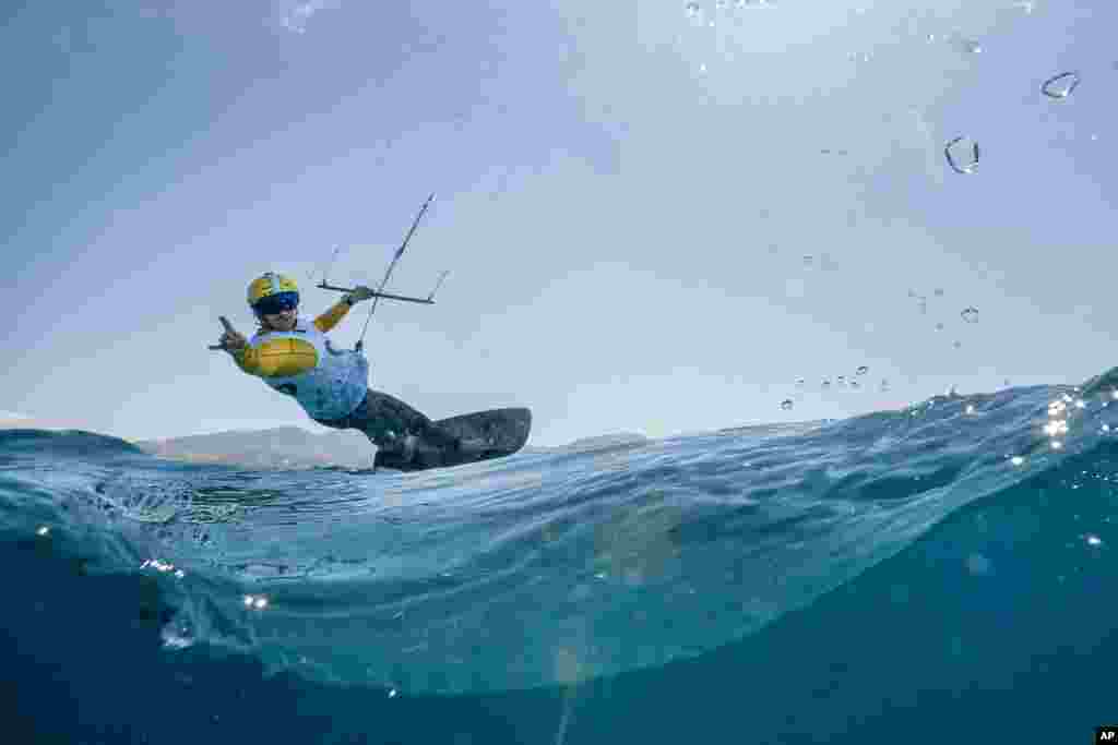 Denis Taradin, of Cyprus, practices for the men's kite event during the 2024 Summer Olympics, in Marseille, France.