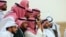 FILE - Saudi men look to spot the first crescent of the moon marking the start of the Muslim holy month of Ramadan, in Hautat Sudair, Saudi Arabia, March 10, 2024. The kingdom announced that Eid al-Fitr, which marks the end of Ramadan, will begin on Wednesday.