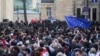 Security forces operate as demonstrators hold a rally to protest against a 'foreign influence' bill in Tbilisi, Georgia, May 1, 2024.