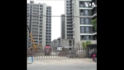 9-P-LNC-TP China Eases Home Purchase Limits in Major Cities.mp4