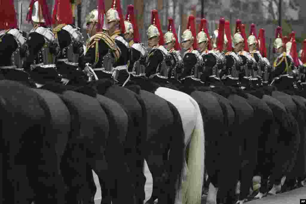 The Household Cavalry Mounted Regiment practices for the state ceremonial, at Hyde Park in London.