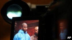 FILE - Thabo Bester is seen on a TV camera screen in the Western Cape High Court, in Cape Town, South Africa, May 3, 2012, where he appeared in connection with murder.
