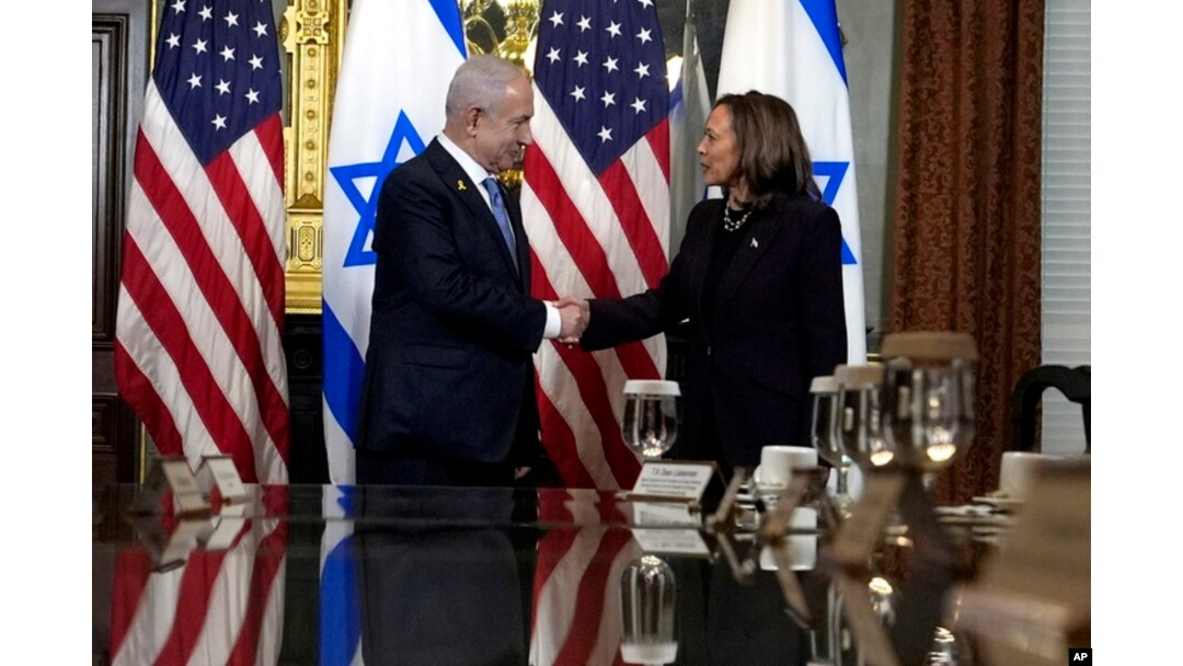 Vice President Kamala Harris shakes hands with Israeli Prime Minister Benjamin Netanyahu before a meeting at the Eisenhower Executive Office Building on the White House complex in Washington, July 25, 2024.