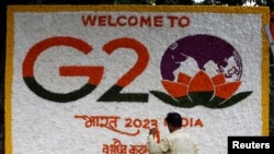 印度新德里街頭宣傳G20峰會的鮮花裝飾畫。（2023年9月8日）
