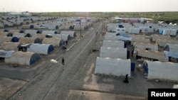 Pemandangan dari atas kamp pengungsi Jadah, yang menjadi tempat tinggal dari sejumlah warga yang diduga memiliki kaitan dengan kelompok ISIS, di Qayyara, Irak, pada 7 April 2023. (Foto: Reuters/Abdullah Rashid)