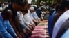 (FILE) Muslim devotees offer the first Friday prayers of Islam's holy fasting month of Ramadan in Karachi on March 15, 2024.