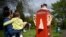 A refurbished telephone call box decorated with the ears and crown of King Charles III, is pictured in the village of Compton, Surrey, west of London, ahead of the coronation weekend.